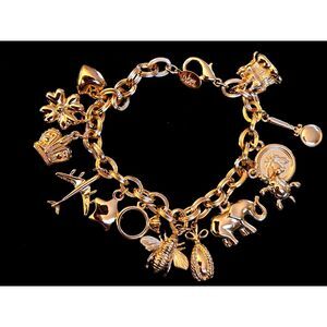 Iconic Vintage Joan Rivers My Favorite Things Charm Bracelet Gold Tone 13 Charms
